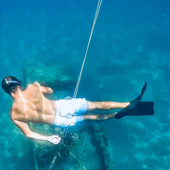 Snorkeling among shipwreck remains